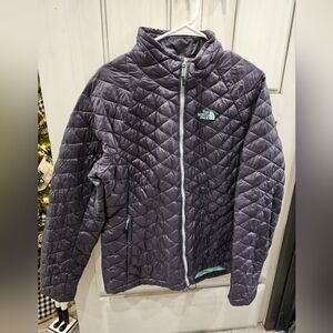 Women's The North Face puffer jacket, XL, purple with teal accents.